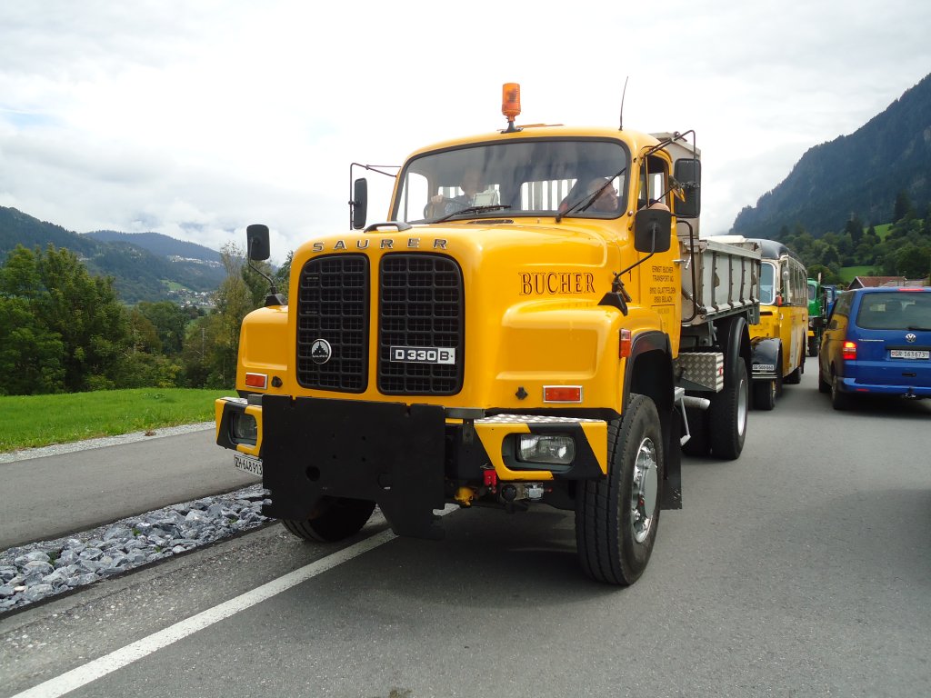 (129'895) - Bucher, Glattfelden - Nr. 1/ZH 648'913 - Saurer am 18. September 2010 in Castrisch, Schleps