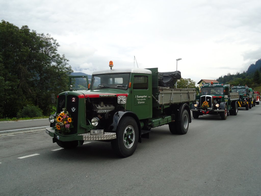 (129'906) - Baumgartner, Glarus - Nr. 2/GL 133 - Saurer am 18. September 2010 in Castrisch, Schleps