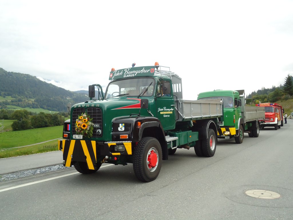 (129'908) - Baumgartner, Glarus - GL 751 - Saurer am 18. September 2010 in Castrisch, Schleps