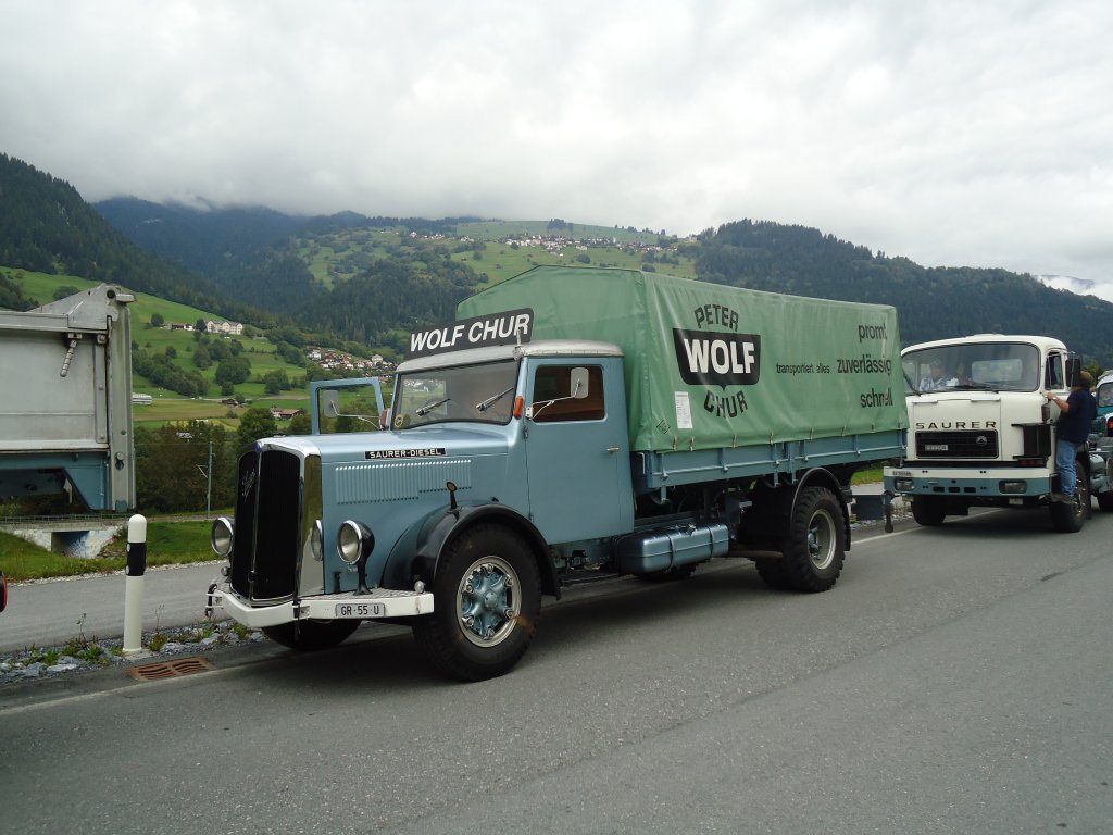 (129'916) - Wolf, Chur - GR 55 U - Saurer am 18. September 2010 in Castrisch, Schleps