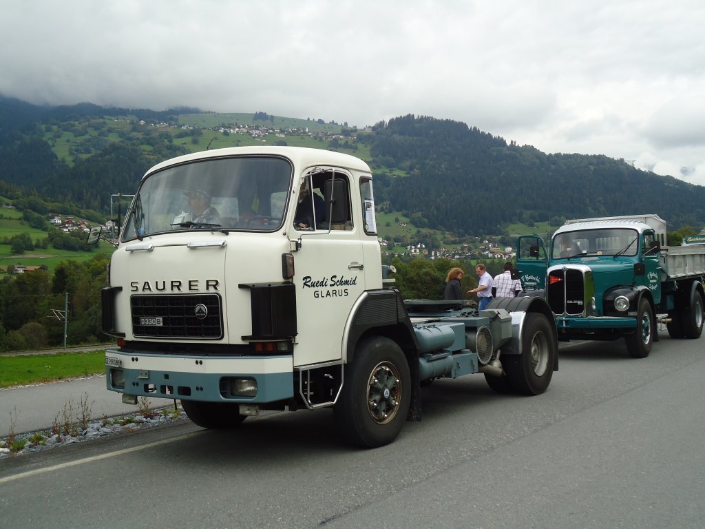 (129'922) - Schmid, Glarus - SZ 200'088 - Saurer am 18. September 2010 in Castrisch, Schleps