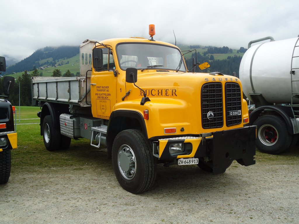 (129'978) - Bucher, Glattfelden - Nr. 1/ZH 648'013 - Saurer am 18. September 2010 in Breil, Milit�ranlage