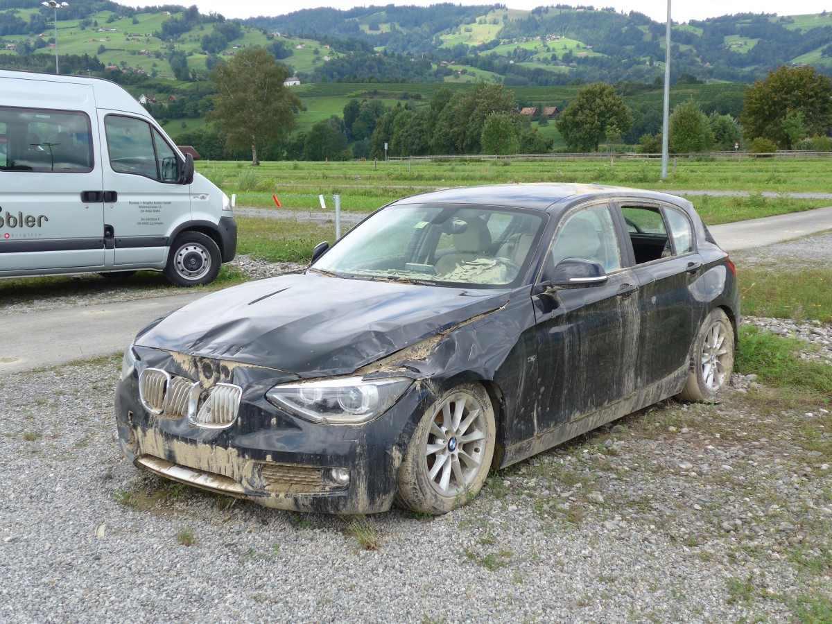 (153'884) - BMW am 16. August 2014 nach dem Unwetter in Altst�tten, Allmendplatz