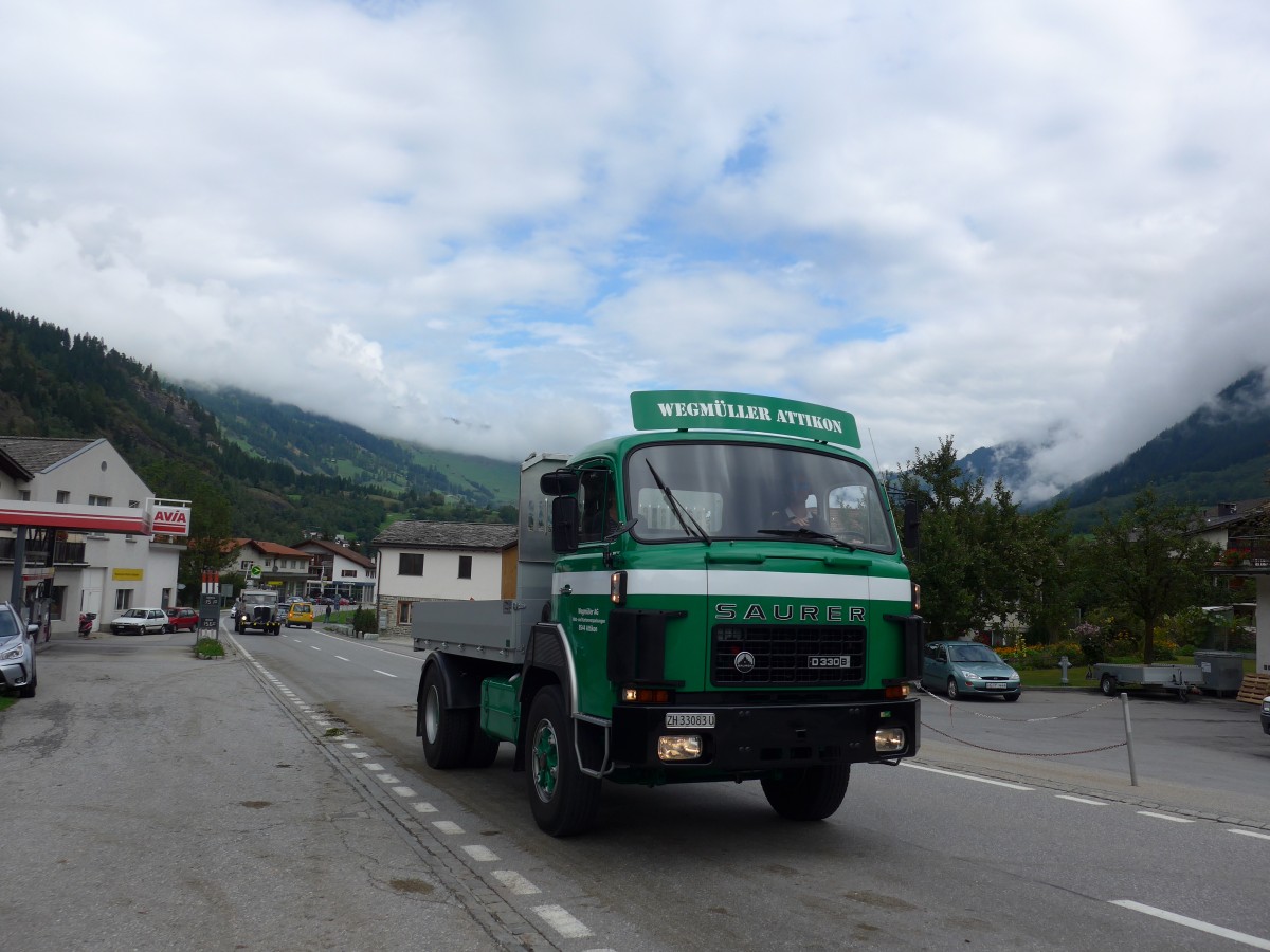 (165'295) - Wegm�ller, Attikon - ZH 33'083 U - Saurer am 19. September 2015 in Andeer, Tgavugl