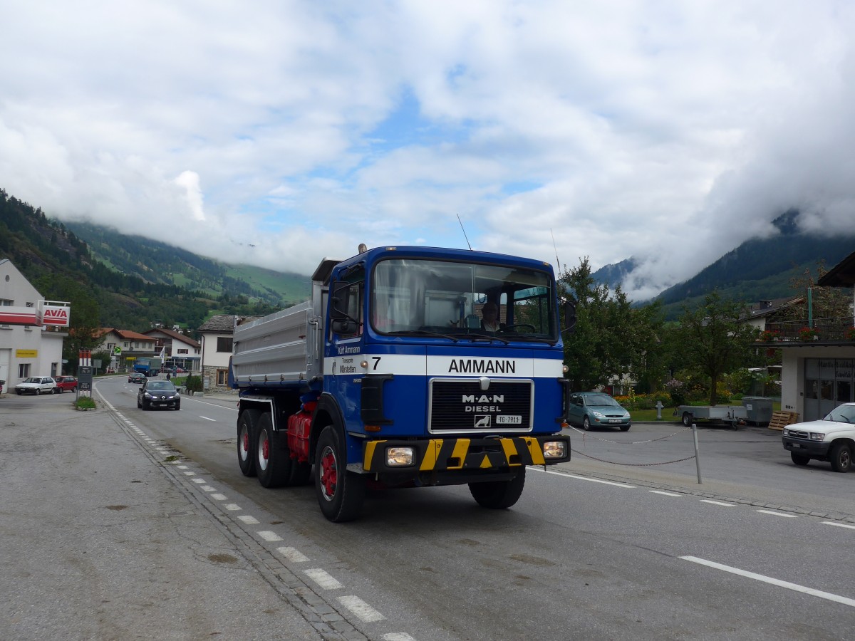 (165'310) - Ammann, M�rstetten - Nr. 7/TG 7911 - MAN am 19. September 2015 in Andeer, Tgavugl