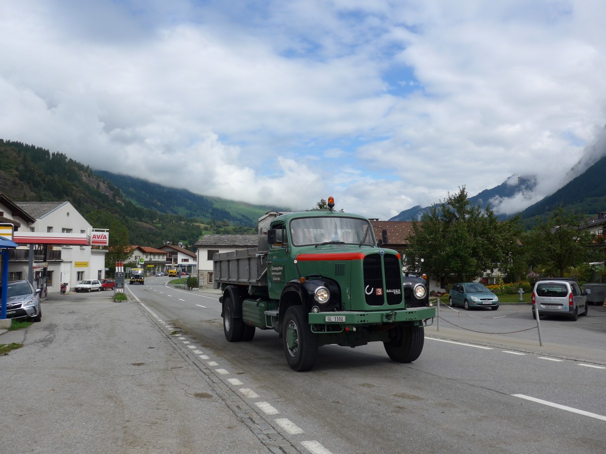 (165'327) - Baumgartner, Glarus - GL 1102 - Saurer am 19. September 2015 in Andeer, Tgavugl
