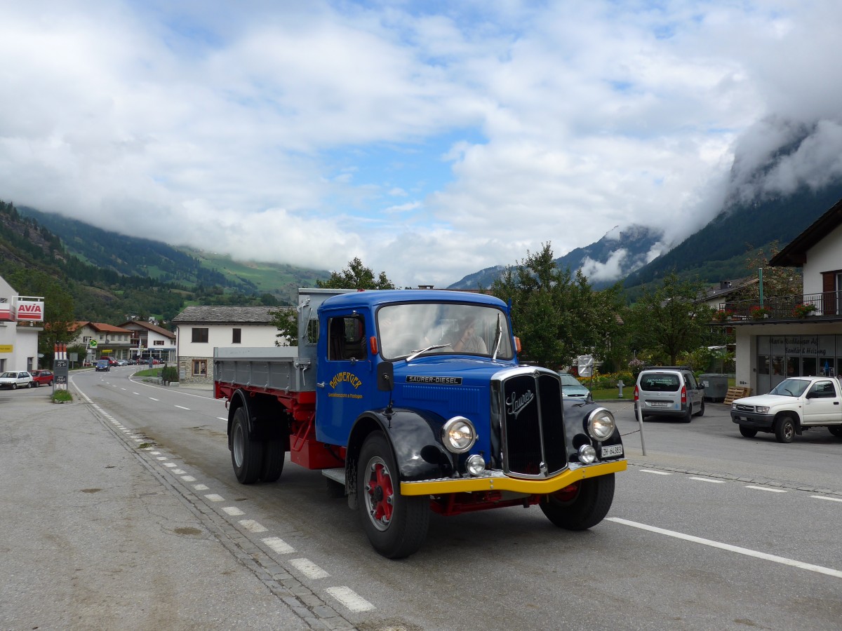 (165'356) - Bauberger - ZH 64'383 - Saurer am 19. September 2015 in Andeer, Tgavugl