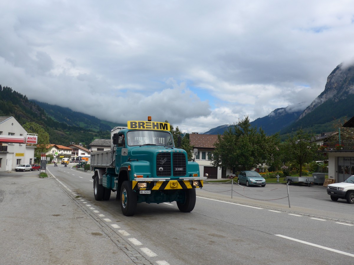 (165'404) - Brem, Lupfig - AG 14'141 - Saurer am 19. September 2015 in Andeer, Tgavugl