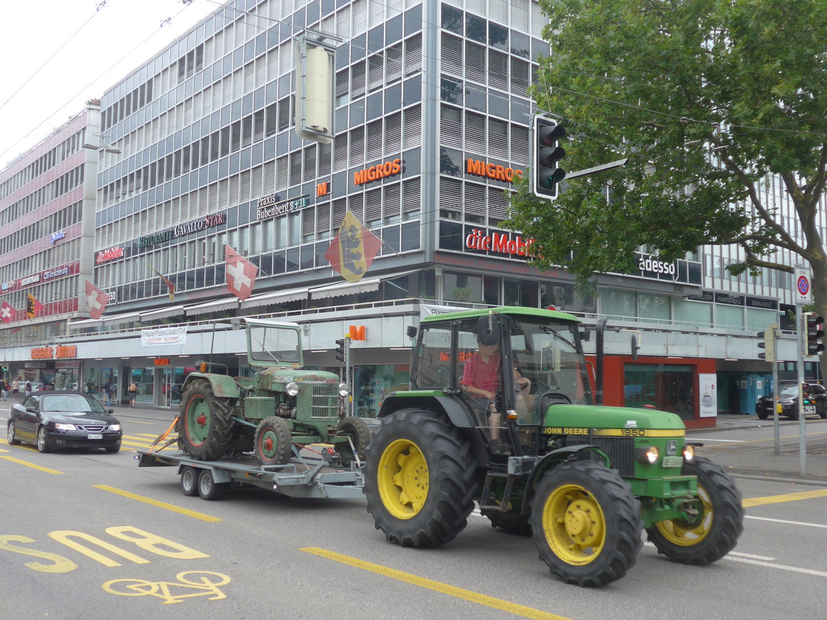 (219'446) - John Deere - BE 11'414 - beladen mit einem B�hrer am 2. August 2020 beim Bahnhof Bern