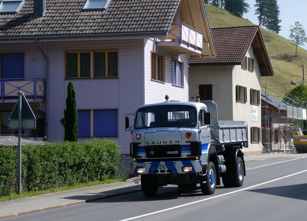 (276'570) - Sch�r - BL 6596 - Saurer am 13. Juni 2025 in Wiggen