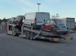 (156'595) - VW-K�fer auf einem Autotransporter am 17.