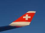 (153'447) - Sonnenaufgang am Fl�gel der Swiss am 21.