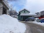 (148'785) - Der Bahnhof Airolo im Schnee am 9.