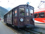 (240'582) - MC-Steuerwagen - Nr. 74 - am 2. Oktober 2022 im Bahnhof Martigny